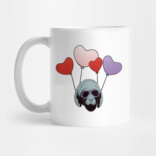 manatee floats on balloons Mug